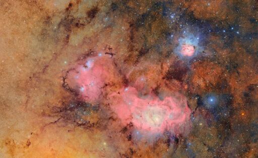 This image combines 678 separate images taken by NSF-DOE Vera C. Rubin Observatory in just over seven hours of observing time. Combining many images in this way clearly reveals otherwise faint or invisible details, such as the clouds of gas and dust that comprise the Trifid nebula (top right) and the Lagoon nebula, which are several thousand light-years away from Earth.
