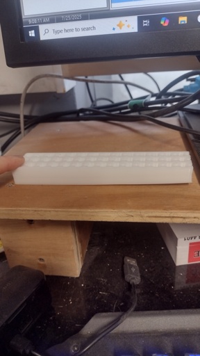 prints appear to be lifting in one corner.