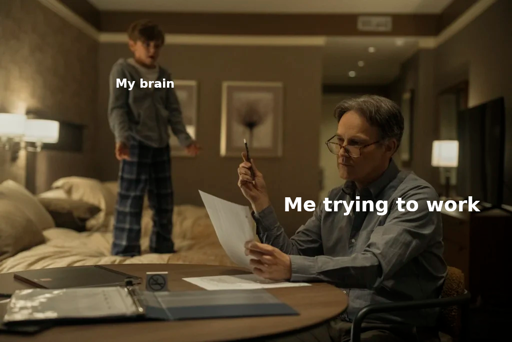 A man seated at a table with a pen and paper while a boy stands on the bed in the background. The man is labeled "me trying to work' and the boy is labeled 'my brain'