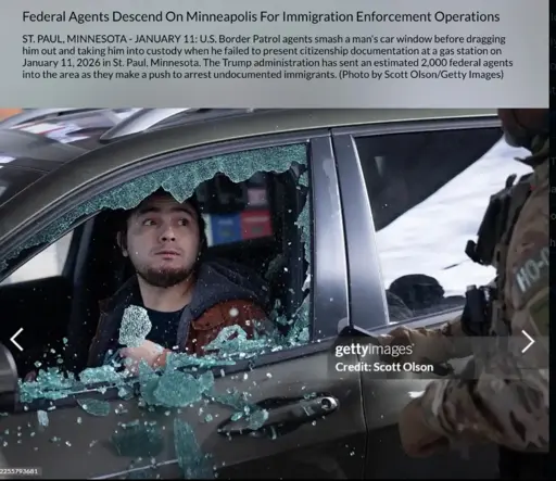 Photo of young man in car who has literally just had his driver side window busted out by ICE, captured by a photographer and posted to Getty images. This was likely the beginning of the video that ends with him surrounded by agents who choked him out, eventually dragged his limp body face first across the pavement as they cuffed him and took him away.